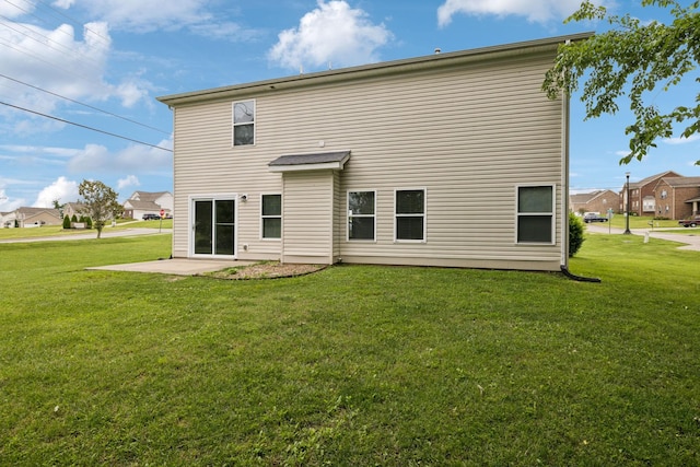 1000 Beverly Ln, Spring Hill, TN 37174 - back of house featuring a lawn and a patio area
