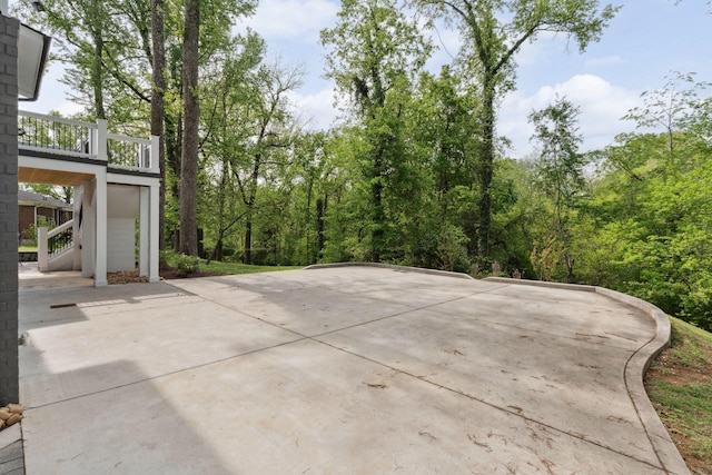 view of patio with stairway