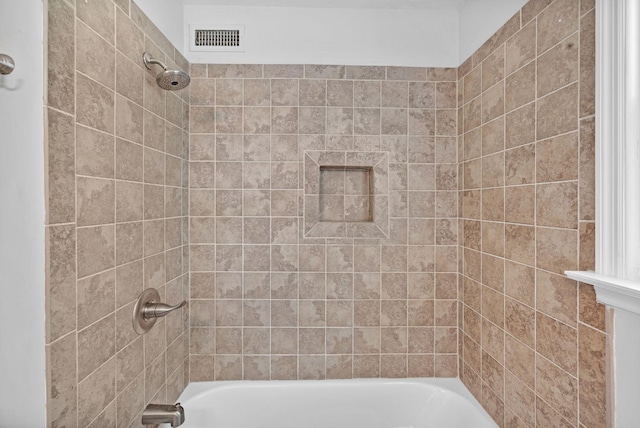bathroom with shower / washtub combination