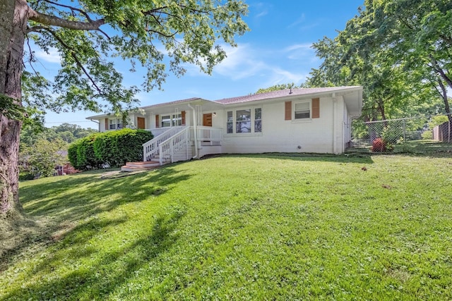 rear view of property featuring brick siding
