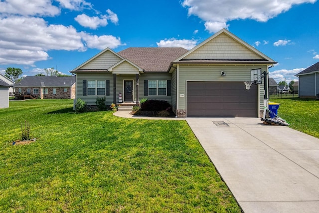 view of front of property featuring a garage, concrete driveway, and a front yard