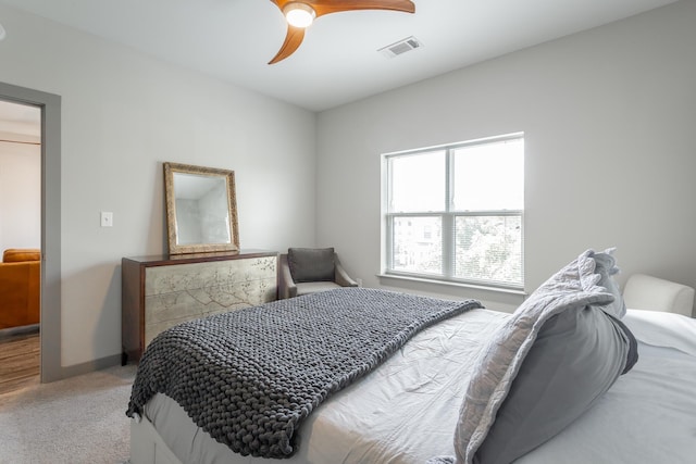 782 Riverfront Pkwy Unit 216, Chattanooga, TN 37402 - bedroom with light carpet, a ceiling fan, and baseboards