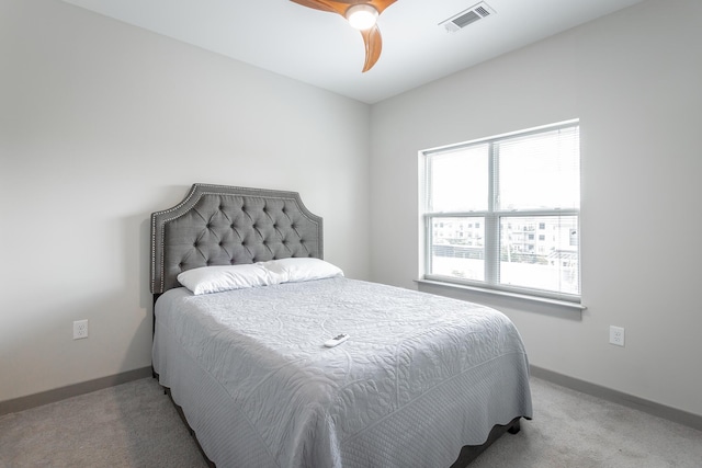 782 Riverfront Pkwy Unit 216, Chattanooga, TN 37402 - bedroom with light carpet, baseboards, and ceiling fan