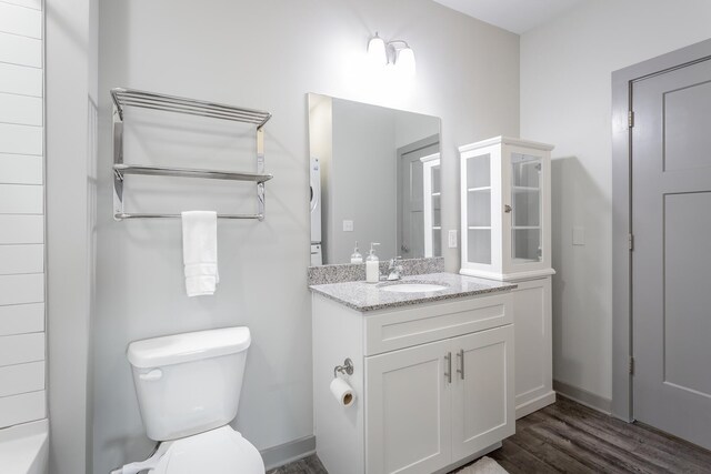 782 Riverfront Pkwy Unit 216, Chattanooga, TN 37402 - full bathroom with toilet, vanity, wood finished floors, and baseboards