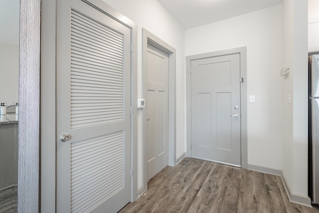 782 Riverfront Pkwy Unit 216, Chattanooga, TN 37402 - hallway with wood finished floors and baseboards