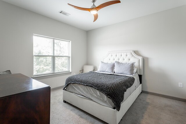782 Riverfront Pkwy Unit 216, Chattanooga, TN 37402 - carpeted bedroom featuring baseboards and ceiling fan