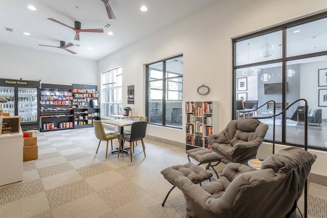 782 Riverfront Pkwy Unit 216, Chattanooga, TN 37402 - living area featuring recessed lighting, ceiling fan, carpet floors, and baseboards