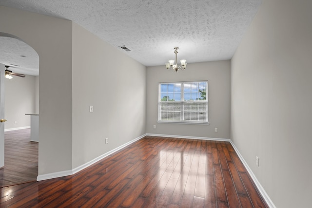 5029 Luker Ln, Antioch, TN 37013 - empty room featuring arched walkways, wood-type flooring, baseboards, a chandelier, and a textured ceiling