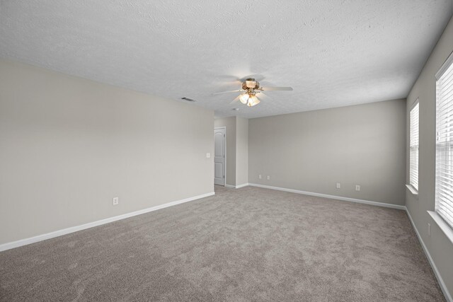 5029 Luker Ln, Antioch, TN 37013 - carpeted spare room featuring ceiling fan, a textured ceiling, and baseboards