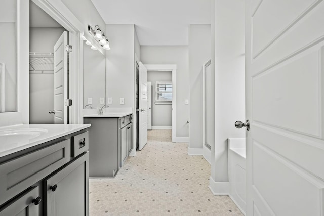 1132 General Marshall Ct, Murfreesboro, TN 37129 - bathroom with tile patterned floors, baseboards, two vanities, and a shower