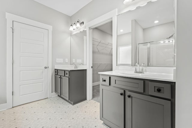 1132 General Marshall Ct, Murfreesboro, TN 37129 - bathroom with tile patterned floors, a stall shower, baseboards, two vanities, and a walk in closet