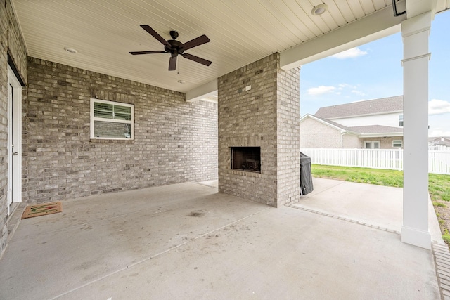 1132 General Marshall Ct, Murfreesboro, TN 37129 - view of patio / terrace with an outdoor brick fireplace, fence, and a ceiling fan