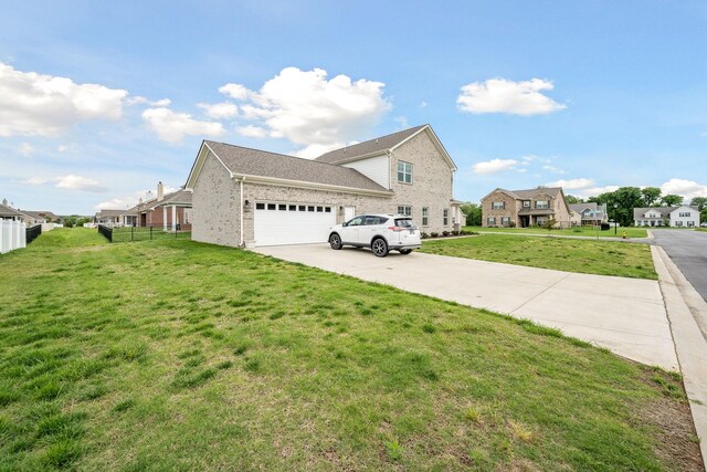 1132 General Marshall Ct, Murfreesboro, TN 37129 - view of side of property featuring an attached garage, driveway, a residential view, and brick siding