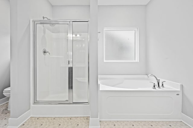 1132 General Marshall Ct, Murfreesboro, TN 37129 - bathroom featuring a stall shower, a bath, baseboards, and toilet