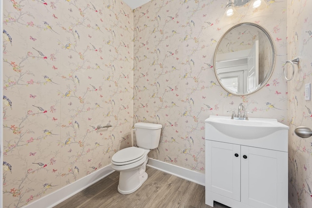 1132 General Marshall Ct, Murfreesboro, TN 37129 - half bathroom featuring wood finished floors, vanity, toilet, baseboards, and wallpapered walls