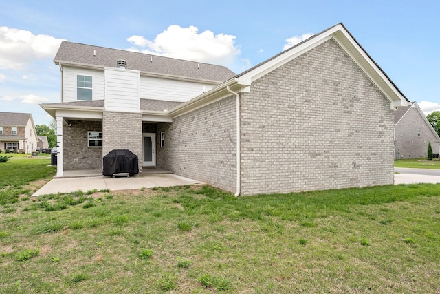 1132 General Marshall Ct, Murfreesboro, TN 37129 - rear view of property featuring a patio area, a yard, and brick siding