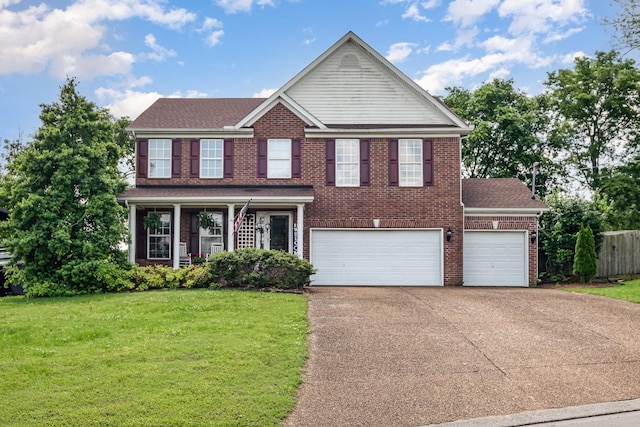 101 Wolverine Trl, La Vergne, TN 37086 - view of front facade with concrete driveway, brick siding, a shingled roof, and an attached garage