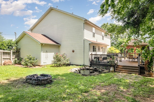 101 Wolverine Trl, La Vergne, TN 37086 - back of property featuring an outdoor fire pit, a gazebo, and a deck