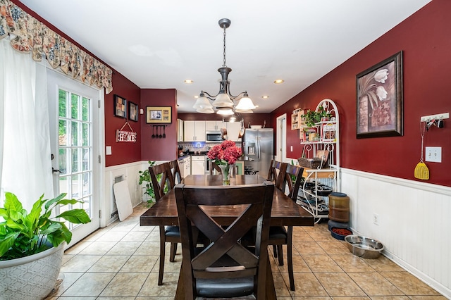 101 Wolverine Trl, La Vergne, TN 37086 - dining space with a wainscoted wall, a chandelier, light tile patterned flooring, a decorative wall, and recessed lighting