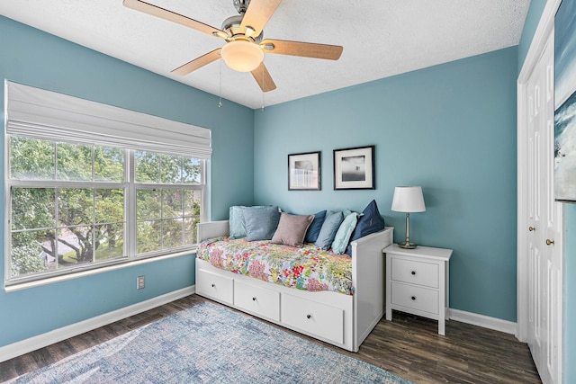 102 Braxton Park Ct, Goodlettsville, TN 37072 - bedroom featuring baseboards, wood finished floors, a ceiling fan, and a textured ceiling