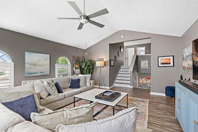 102 Braxton Park Ct, Goodlettsville, TN 37072 - living area with wood finished floors, a ceiling fan, vaulted ceiling, baseboards, and a textured ceiling