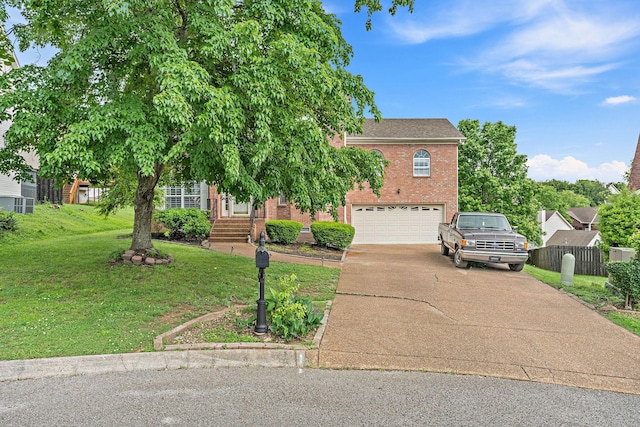 102 Braxton Park Ct, Goodlettsville, TN 37072 - view of front of home with concrete driveway, brick siding, a garage, and roof with shingles