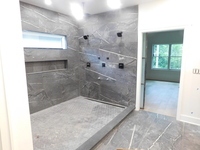 4026B Lealand Ln, Nashville, TN 37204 - bathroom featuring a marble finish shower and marble look tiles