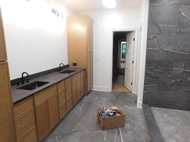 4026B Lealand Ln, Nashville, TN 37204 - full bath featuring a sink and marble look tile flooring