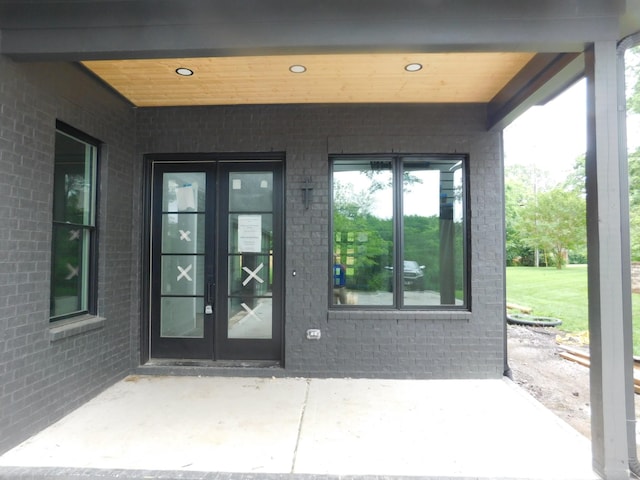 4026B Lealand Ln, Nashville, TN 37204 - view of exterior entry featuring french doors, brick siding, and a patio area