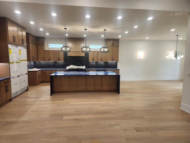 4026B Lealand Ln, Nashville, TN 37204 - kitchen featuring wall oven, light wood-style flooring, a center island, a chandelier, and recessed lighting