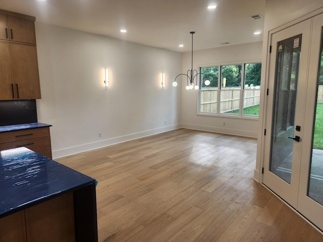 4026B Lealand Ln, Nashville, TN 37204 - unfurnished dining area featuring light wood-style flooring, recessed lighting, and a chandelier