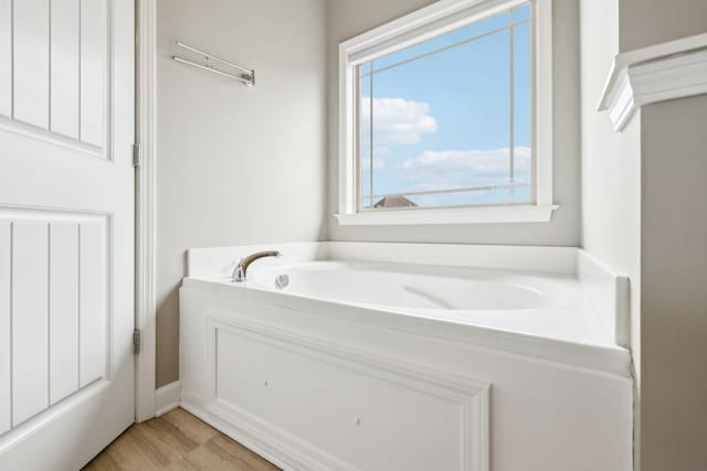 full bath featuring a bath