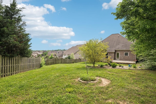 view of yard with a deck
