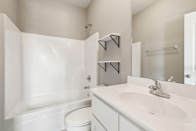 full bathroom featuring  shower combination, toilet, and vanity