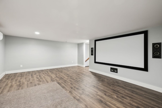 cinema with wood finished floors, baseboards, and recessed lighting