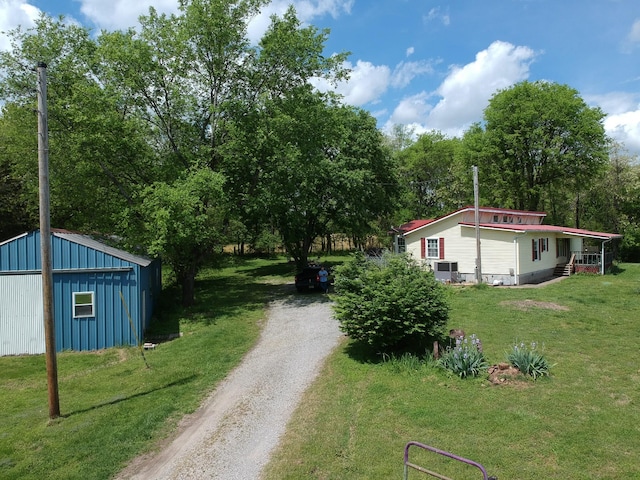 170 School House Ln, Castalian Springs, TN 37031 - view of dirt / gravel driveway