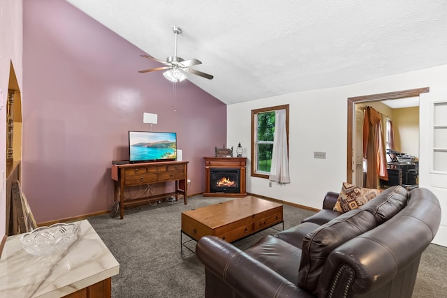 170 School House Ln, Castalian Springs, TN 37031 - living area with carpet floors, ceiling fan, lofted ceiling, baseboards, and a lit fireplace