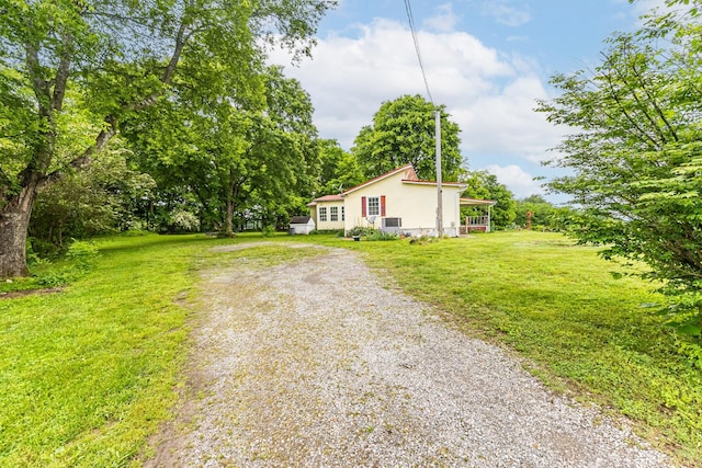 170 School House Ln, Castalian Springs, TN 37031 - view of front of house with driveway and a front lawn