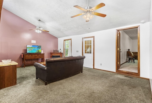 170 School House Ln, Castalian Springs, TN 37031 - carpeted living area with ceiling fan, lofted ceiling, a textured ceiling, and baseboards