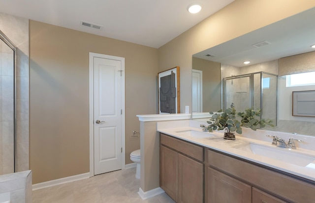 3292 Barrel Oak Pass, Columbia, TN 38401 - bathroom featuring a shower stall, toilet, double vanity, and baseboards