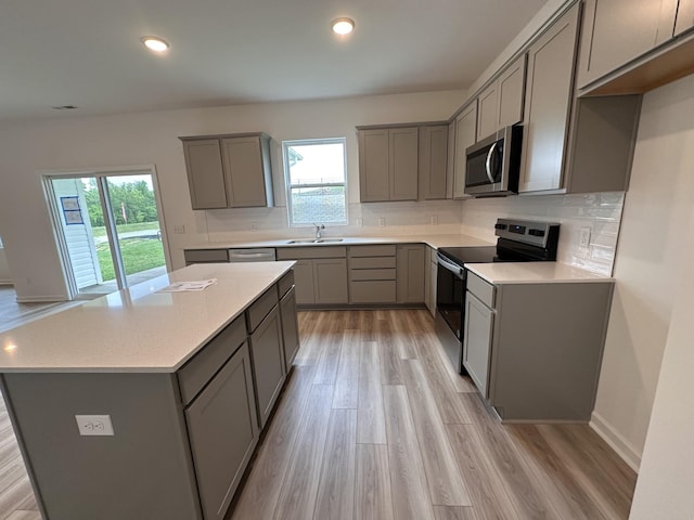 3292 Barrel Oak Pass, Columbia, TN 38401 - kitchen with stainless steel appliances, gray cabinets, healthy amount of natural light, and recessed lighting