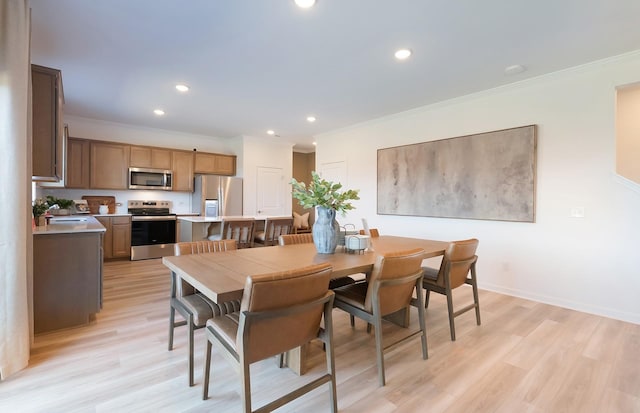 3292 Barrel Oak Pass, Columbia, TN 38401 - dining space with crown molding, recessed lighting, light wood finished floors, and baseboards