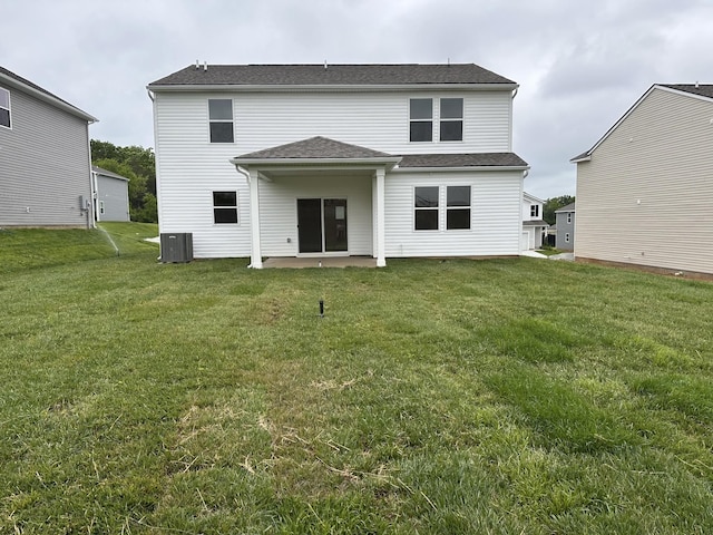 3292 Barrel Oak Pass, Columbia, TN 38401 - back of house featuring central air condition unit, a patio, and a lawn