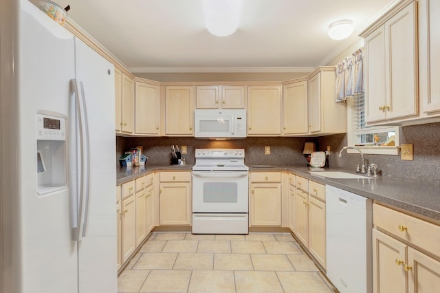 kitchen featuring white appliances, a sink, cream cabinetry, decorative backsplash, and ornamental molding