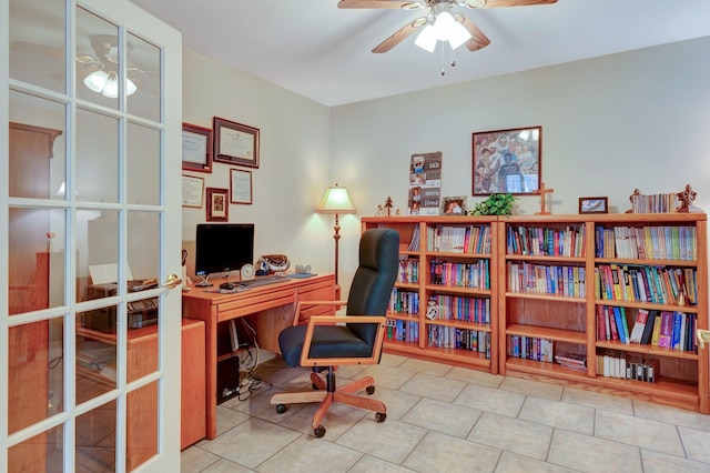 office featuring ceiling fan and tile patterned flooring