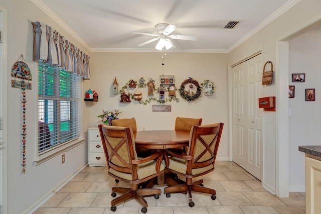 dining space featuring ceiling fan, ornamental molding, light tile patterned floors, and baseboards