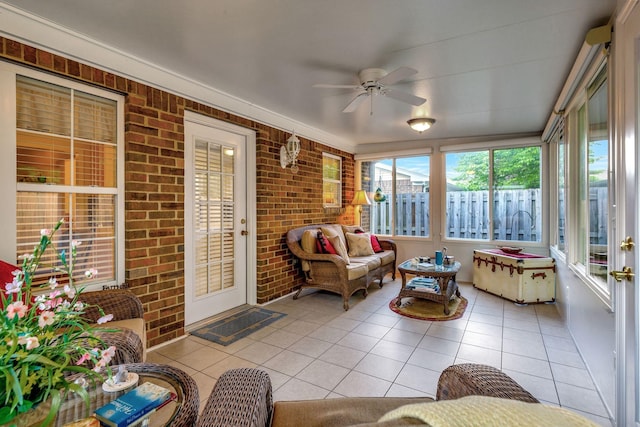 sunroom with ceiling fan