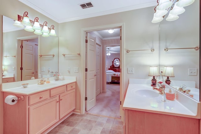 bathroom with a chandelier, two vanities, ensuite bath, and ornamental molding