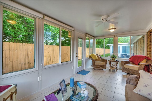 sunroom / solarium with ceiling fan