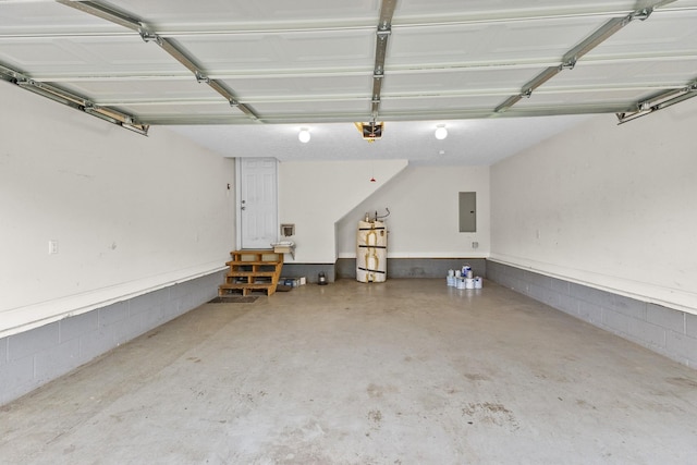 203 Abbigael Dr, Portland, TN 37148 - garage with electric panel, a garage door opener, water heater, and concrete block wall